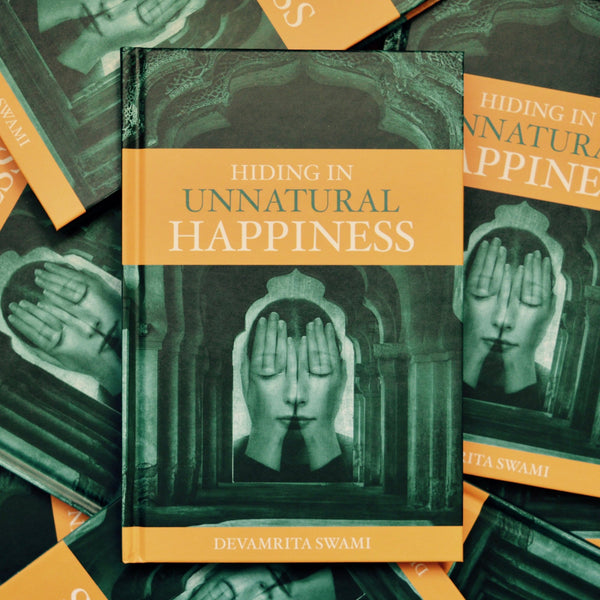 HIDING IN UNNATURAL HAPPINESS